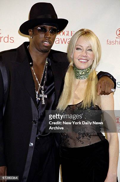 Sean Puffy Combs and Heather Locklear attending the VH1/Vogue fashion awards at the 69th Regiment Armory.