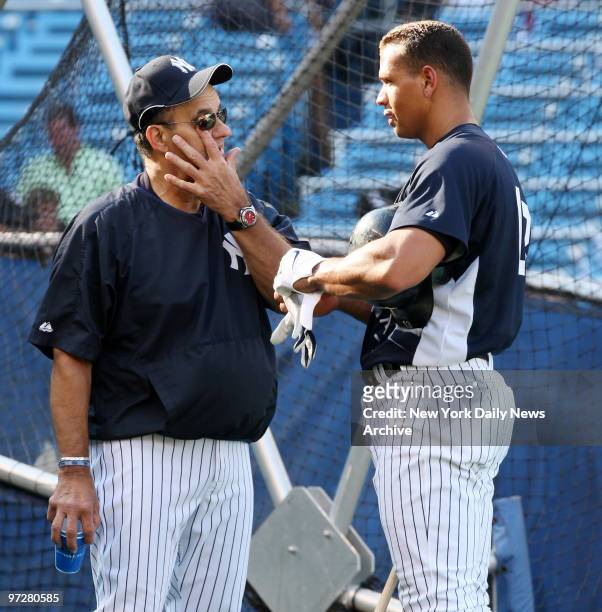 New York Yankees' Alex Rodriguez speaks with manager Joe Torre during batting practice before the start of a game against the Chicago White Sox at...