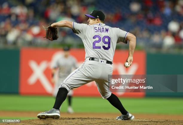 Bryan Shaw of the Colorado Rockies throws a pitch in the eighth inning during a game against the Philadelphia Phillies at Citizens Bank Park on June...