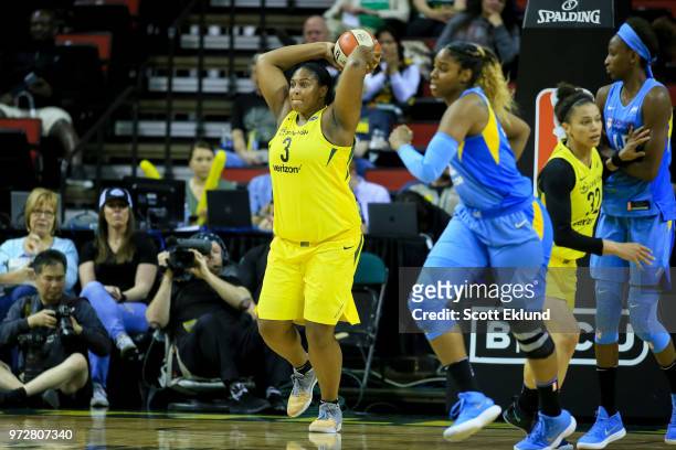 Center Courtney Paris of the Seattle Storm passes the ball during the game against the Chicago Sky on June 12, 2018 at KeyArena in Seattle,...