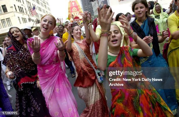 Followers of Hare Krishna take part in their annual parade down Fifth Ave, beginning at 59th St. And ending at Washington Square Park.