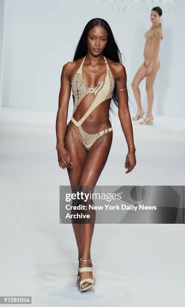 Naomi Campbell models a swimsuit during the showing of the new Rosa Ch? collection as part of Spring Fashion Week 2003 at Cipriani 42nd Street.