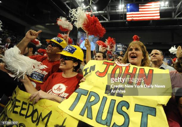 Crowds cheer at a midnight rally for Presidential candidate Senator John McCain at the Bank United Center, in Miami, Florida