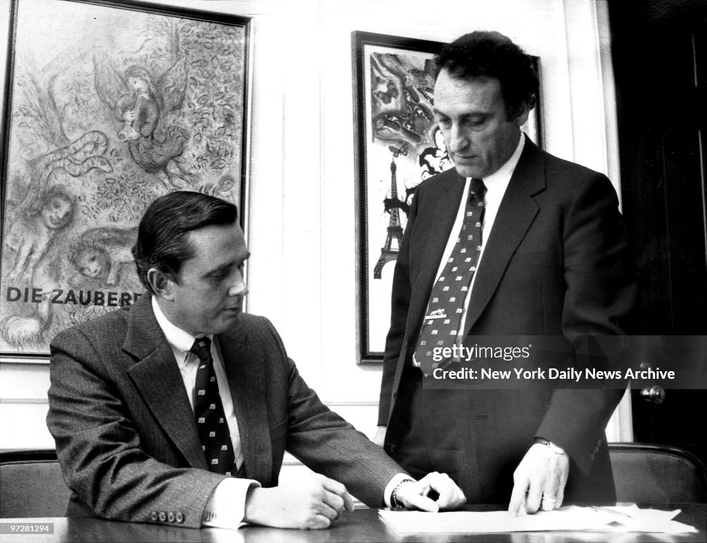 James Robinson (l.), Chairman of American Express and Sanfor