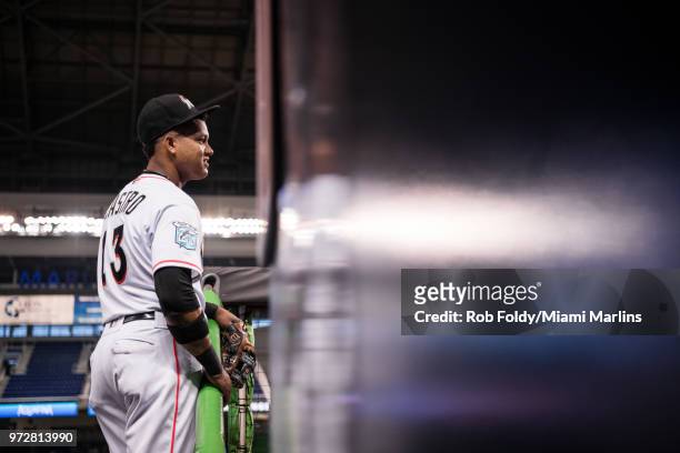 Starlin Castro of the Miami Marlins looks on from the dugout before the game against the San Francisco Giants at Marlins Park on June 12, 2018 in...