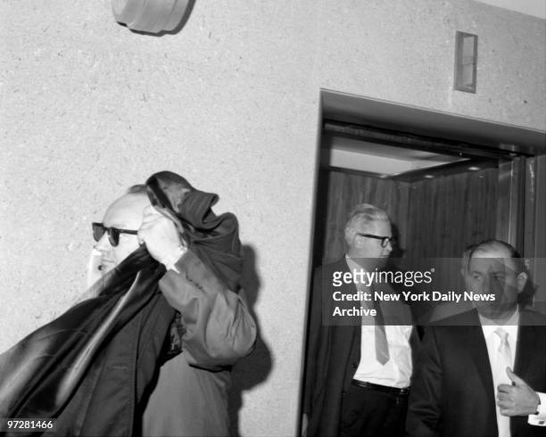 Don Alongi ; Member of District Attorney's staff , Joe Gallo (shoulder & right side of face showing, and Joe Colombo, , as they arrive back for...