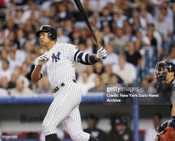 New York Yankees' Alex Rodriguez hits a two-run homer to left in the seventh inning of a game against the Seattle Mariners at Yankee Stadium. It was...