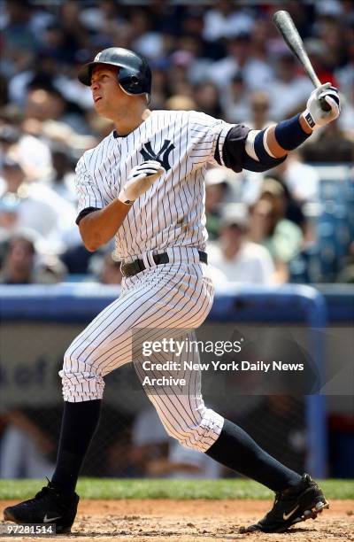 New York Yankees' Alex Rodriguez hits a two-run homer to left in the third inning of a game against the New York Mets at Yankee Stadium. The Yanks...