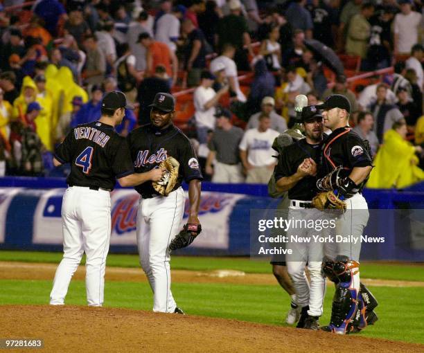 The New York Mets' Robin Ventura, Armando Benitez, Todd Zeile and Todd Pratt celebrate their 2-0 win over the New York Yankees in the third and final...