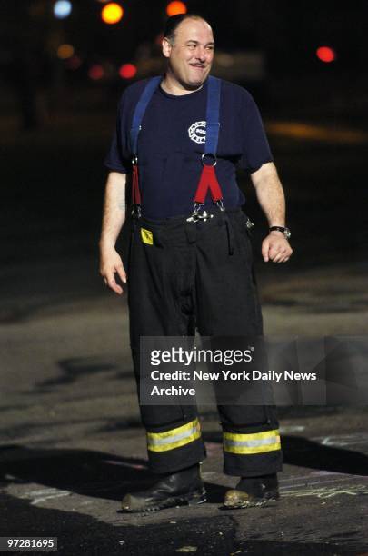 James Gandolfini is dressed as a firefighter as he films a scene from the upcoming movie "Romance & Cigarettes" on Court St. In Red Hook, Brooklyn.