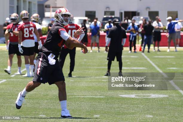 San Francisco 49ers Quarterback Jimmy Garoppolo starts to connect with teammates during minicamp on June 12, 2018 at the SAP Performance Facility in...