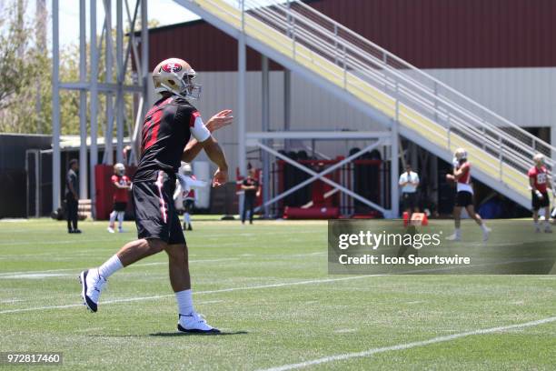 San Francisco 49ers Quarterback Jimmy Garoppolo throwing downfield during minicamp on June 12, 2018 at the SAP Performance Facility in Santa Clara,...