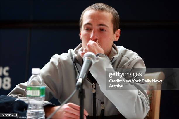 Second Place finisher Dathan Ritzenheim reacts as New York Road Runners President and CEO Mary Wittenberg announces the death of Runner Ryan Shea...