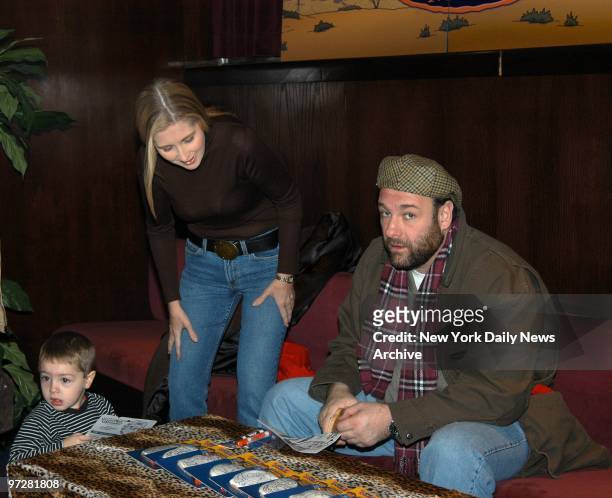 James Gandolfini, wife Marcy and son Michael get together over a game of Color a Cookie at the New York premiere of "The Wild Thornberrys Movie" at...