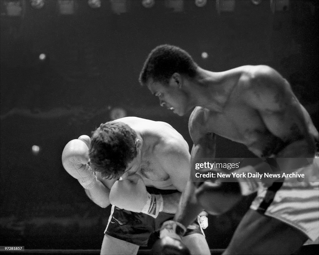 Forest Ward lands a powerhouse right to the head of Tom Conn