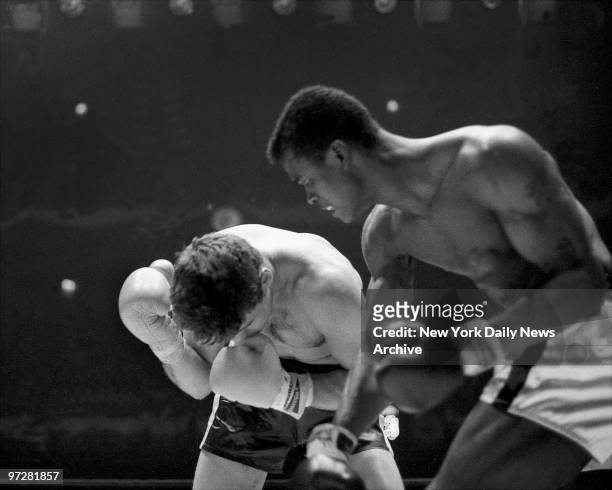 Forest Ward lands a powerhouse right to the head of Tom Connelly in the third round of the 1967 heavyweight open championship. The ref kept Connelly...