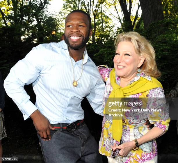 Curtis "Fifty Cent" Jackson, he sponsored a Park in his old neighborhood, greets Bette Midler upon his arrival at the New York Restoration Projects'...