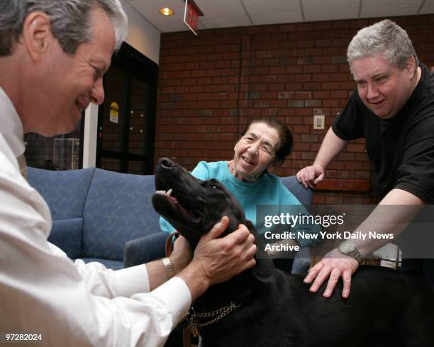 Luca therapy dog, with owner Daniel Reingold, President and CEO of The Hebrew Home at Riverdale visits with resident Miriam Bettler and son at 5901...