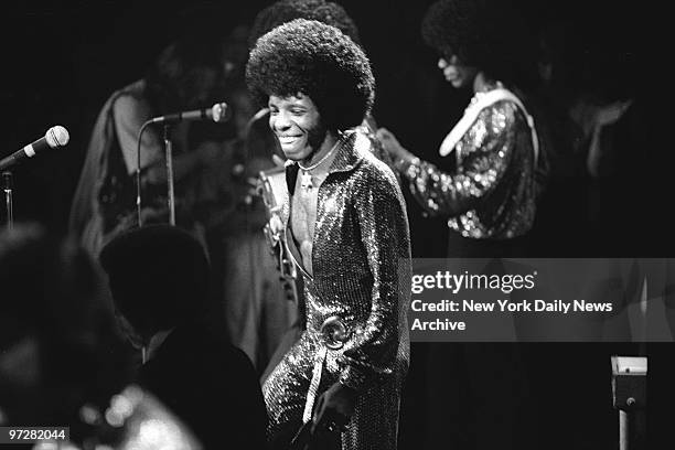 Sly Stone beams after his marriage to Kathy Silva mother of the rock star's 9-month-old son, Sylvester Jr., before 23,000 screaming fans at Madison...