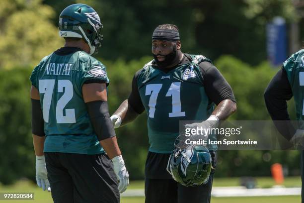 Philadelphia Eagles offensive tackle Jason Peters instructs offensive tackle Halapoulivaati Vaitai during Eagles Minicamp Camp on June 12 at the...
