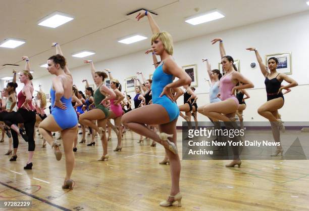 Dancers audition to become one of the famed high-kicking Radio City Music Hall Rockettes. By noon, 150 hopefuls were turned away. Dancers had to be...