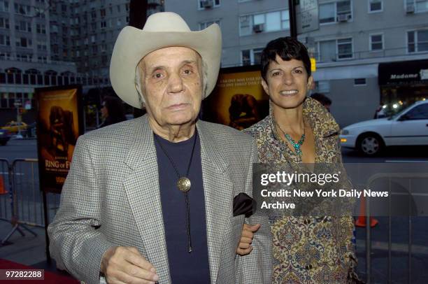 Former boxing champ Jake LaMotta and his fiancee, Denise Baker, arrive at the Beekman Theatre for the world premiere of the movie "Ring of Fire: The...