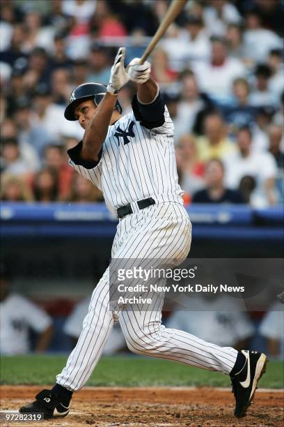 New York Yankees' Alex Rodriguez slams a three-run homer to left field in the second inning of game against the Detroit Tigers at Yankee Stadium. The...