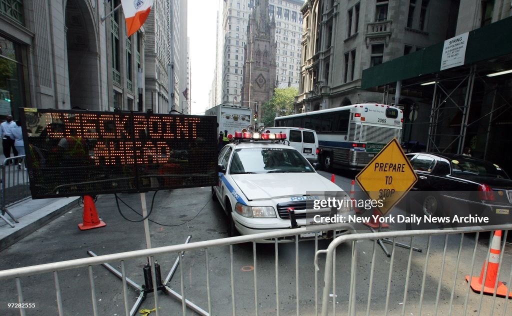 Security is tight at lunch hour on Wall St., outside the New