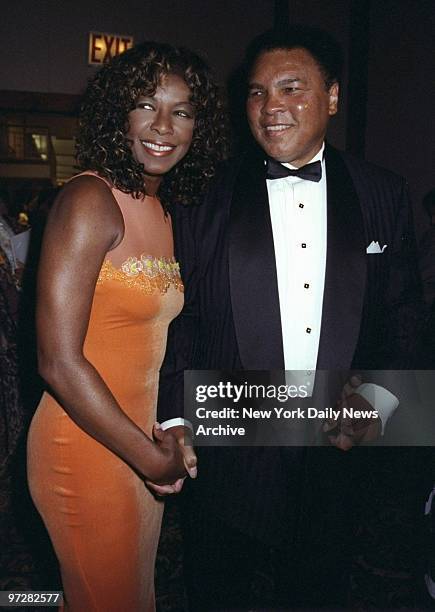 Natalie Cole shakes hands with Muhammad Ali at Amnesty International USA's Second Annual Media Spotlight Awards at Pier Sixty.