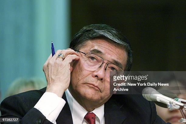 Former Commerce Secretary Norman Mineta testifies at Senate hearing on his confirmation as transportation secretary in the new administration.