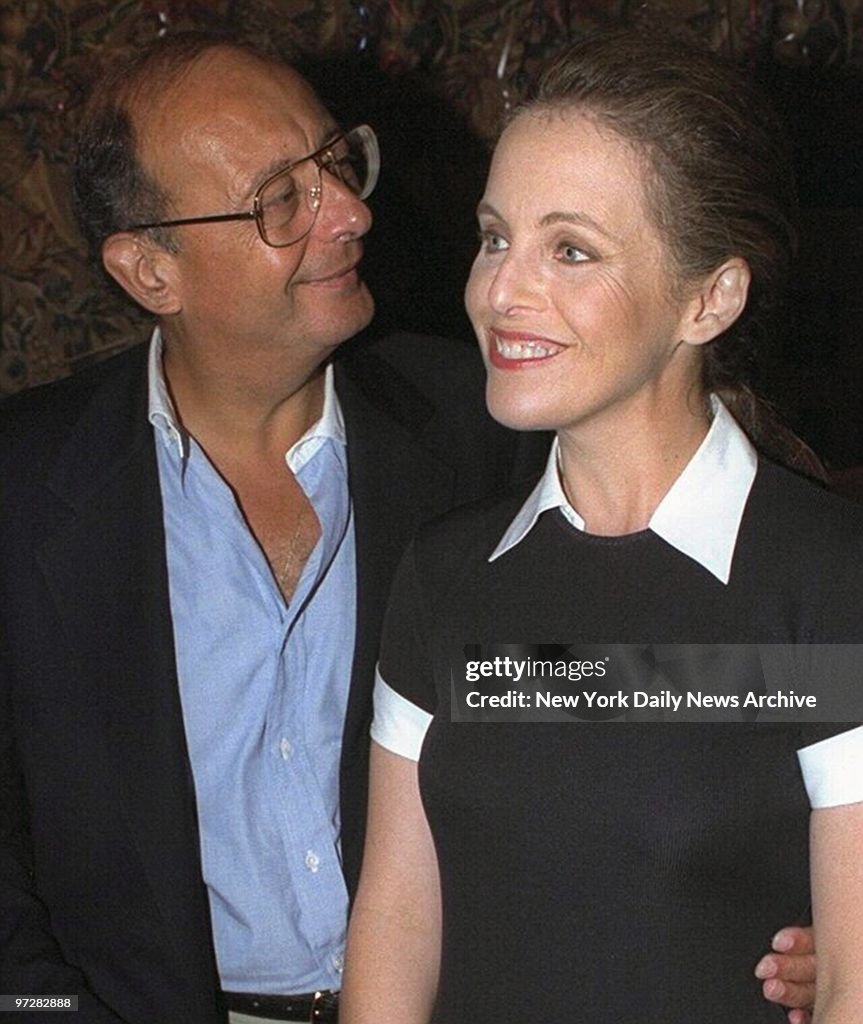 Sen. Alfonse D'Amato and his fiance Claudia Cohen arrive for