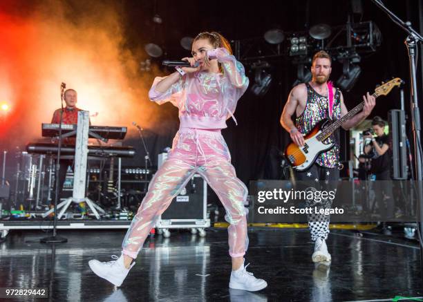 Mandy Lee and band members of Misterwives perform at DTE Energy Music Theater on June 12, 2018 in Clarkston, Michigan.