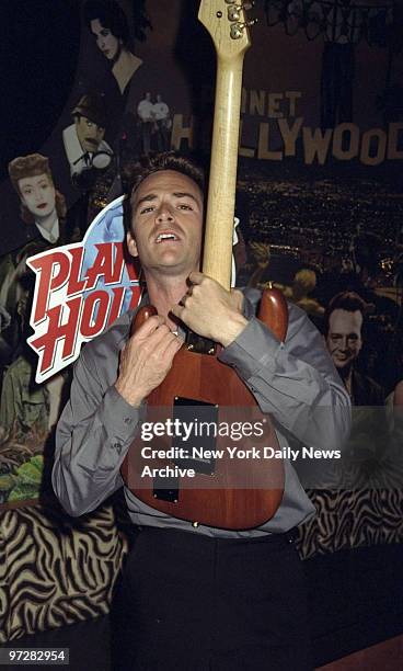 Luke Perry arrives at Planet Hollywood party celebrating his return to the TV show "Beverly Hills 90210." Perry, who donated the guitar that hung on...