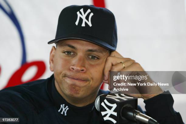 New York Yankees' Alex Rodriguez, who was just acquired from the Texas Rangers a week ago, takes questions at a news conference after arriving at the...