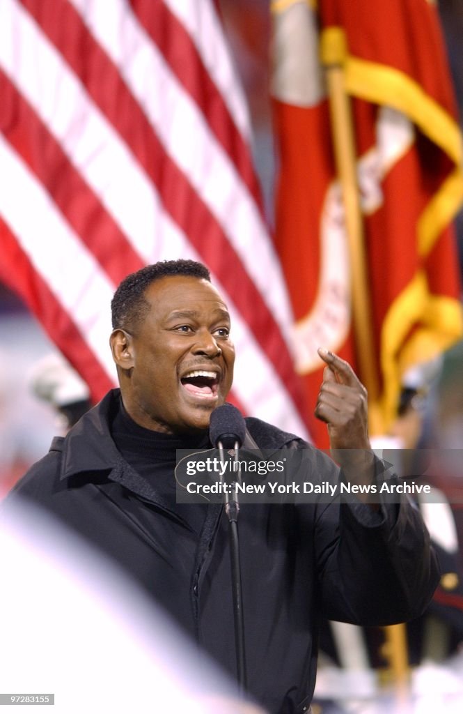 Luther Vandross sings the national anthem before football ga