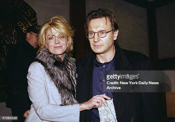 Natasha Richardson and Liam Neeson are on hand for the American Foundation for AIDS Research benefit at Christie's.,