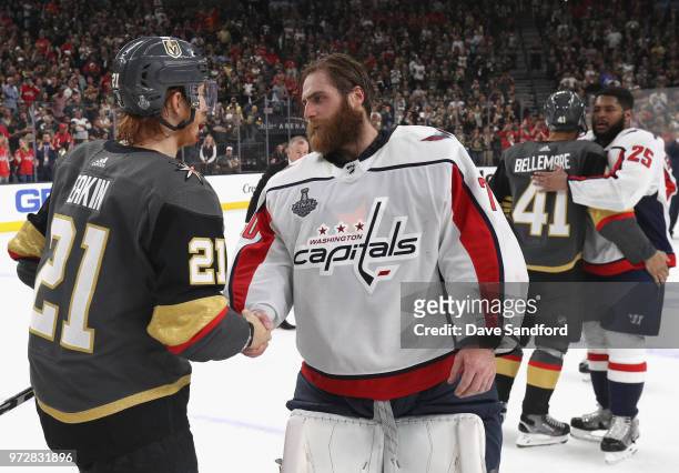 Cody Eakin of the Vegas Golden Knights congratulates goaltender Braden Holtby of the Washington Capitals after the Capitals won the Stanley Cup with...