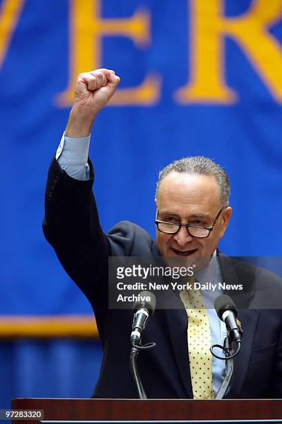 Sen. Charles Schumer puts his fist in the air as he encourages graduating students to "Go for it!" during his commencement address at Pace University...