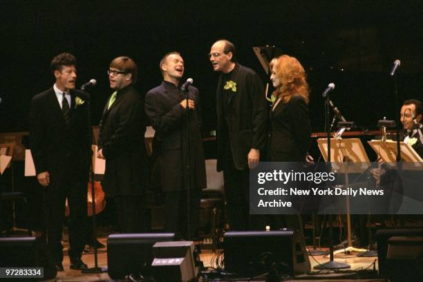 Lyle Lovett , Elton John, Sting, James Taylor and Bonnie Raitt perform at The Rainforest Foundation Benefit Concert at Carnegie Hall.