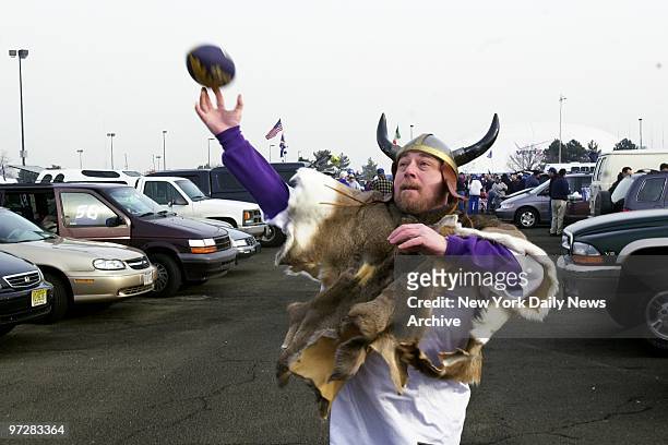 Bruce Bart of Waterbury, Conn., is a happy Viking in parking lot before NFC Championship Game at Giants Stadium between the New York Giants and...