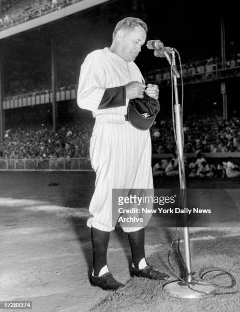 Former New York Yankees' manager Joe McCarthy stands before the mike after making a speech in which he recalled great players of his days of glory,...