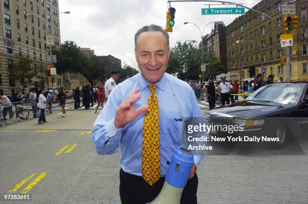 Sen. Chuck Schumer makes his way up the Grand Concourse at the annual Puerto Rican Day Parade in the Bronx.