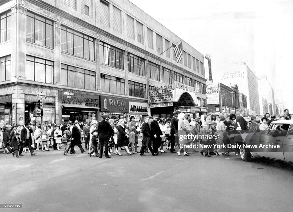 Crowds as they leave the matinee performance of the circus a