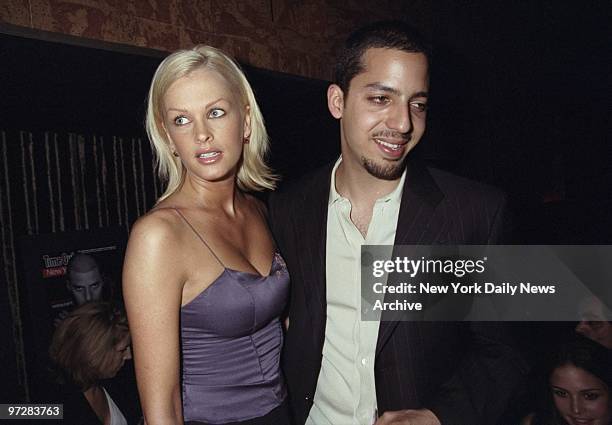 Magician David Blaine gets together with model Kylie Bax at a bon voyage party at Joe's Pub for Blaine, who was preparing to spend a week buried in a...