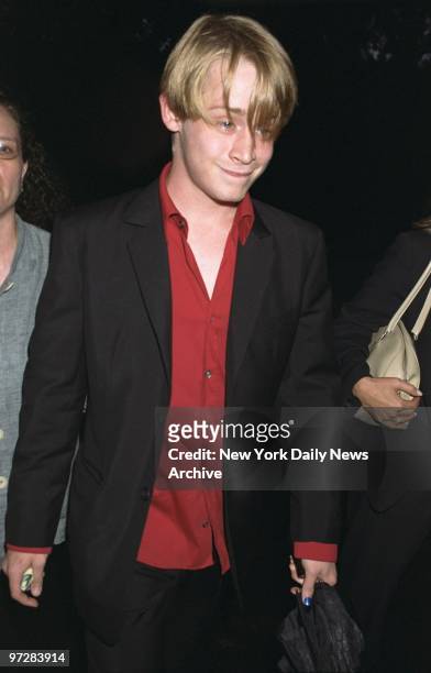 Macaulay Culkin arrives for the opening night of Chekhov's "The Seagull" at the Delacorte Theater in Central Park. Rain interrupted, then stopped the...
