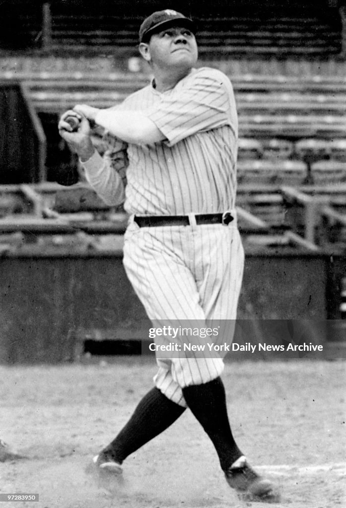 New York Yankees' Babe Ruth swinging his bat. Babe Ruth foll