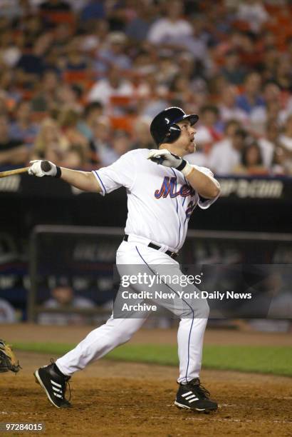 The New York Mets' Karim Garcia hits his second home run in the fifth inning against the Cleveland Indians at Shea Stadium. The Mets went on to win,...