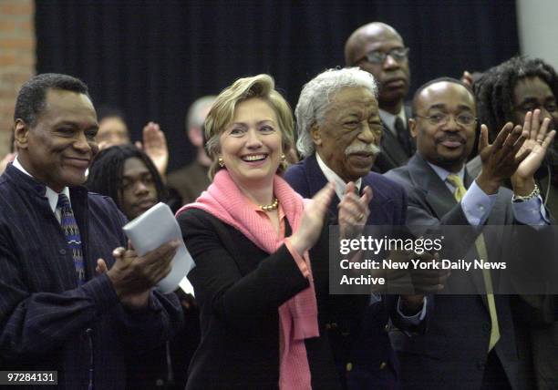 Sen. Hillary Clinton is flanked by Arthur Mitchell , founder and director of the Dance Theater of Harlem, and Gordon Parks, photographer, filmmaker...