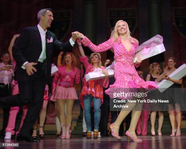 Christian Borle and Laura Bell Bundy are onstage at the Palace Theatre during curtain call after the opening night performance of the Broadway...