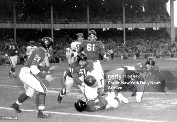 The New York Giants marched to a crushing 47-7 victory over the Chicago Bears to seize National Football League championship at Yankee Stadium....